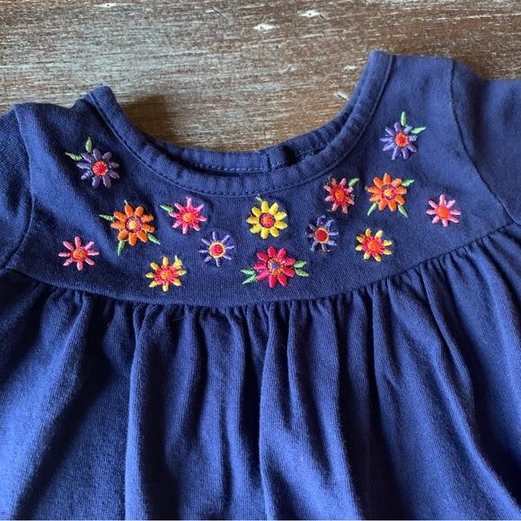 3/$12 Navy Blue Ruffled Short Sleeve Shirt with Flower Details - Picture 2 of 5
